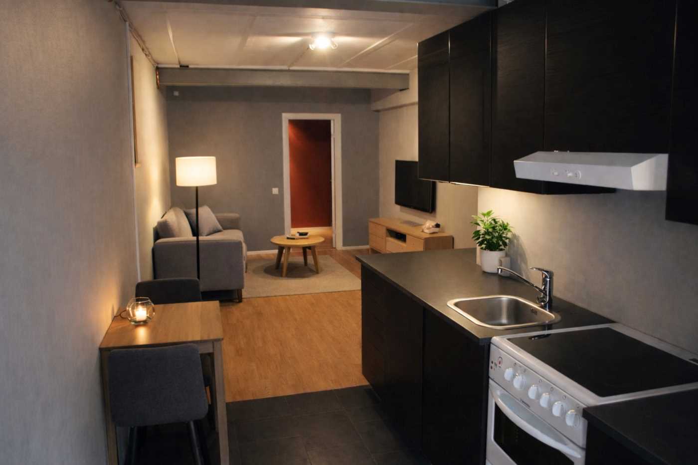 AI möblerad bild på kök o Allrum i uthyrningsdelen